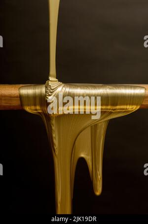 Liquid gold Stock Photo