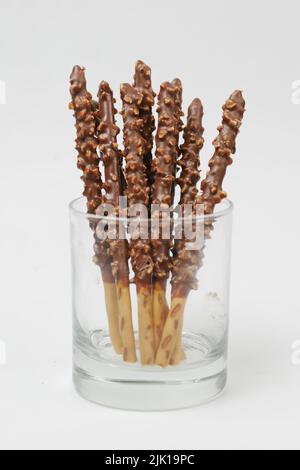 chocolate sticks with almond nut isolated on white background , Stock Photo