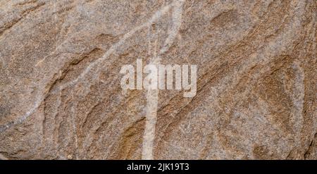 Close up seamless photo of different rock formation surfaces as a background or backdrop. Stock Photo