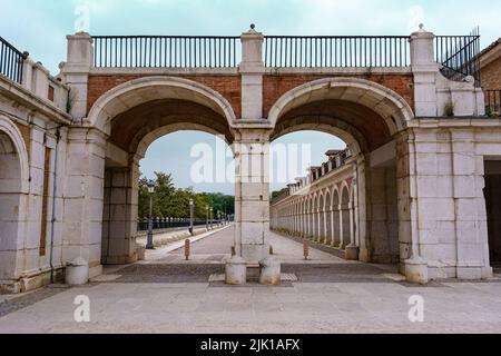 Arches and entrance doors to the royal palace of Aranjuez in Madrid. Spain. Stock Photo