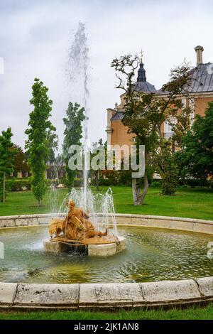 Fountain detail with ancient stone sculptures in the royal palace of Aranjuez. Stock Photo