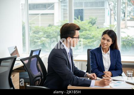 Business people discussing plans for the next month Stock Photo