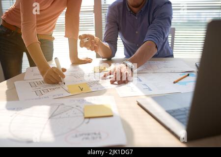 Business people discussing papers on the table Stock Photo