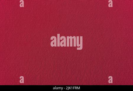 Texture of fabric in burgundy color close-up. Pattern. dark red material Stock Photo