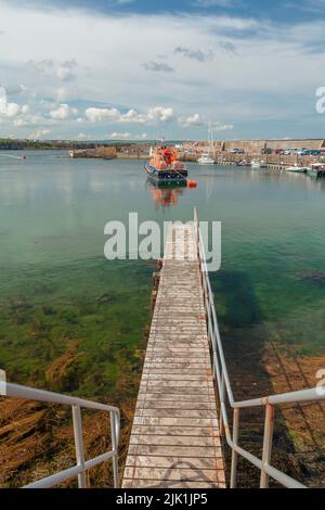 Portrush harbour in County Antrim,Northern Ireland. Located on the Causeway coastal route Stock Photo