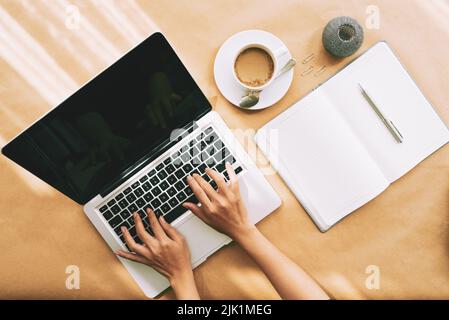Hands of woman working on laptop, view from above Stock Photo
