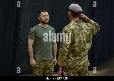 During a working trip to the Odesa region, President Volodymyr Zelenskyy met with servicemen of the Special Operations Forces of the Armed Forces of Ukraine.  The Head of State congratulated the military on their holiday - the Day of Special Operations Forces.  'I want to thank you for your great work, for your heroism. I ask you to continue doing everything to make the enemy feel that they will never have peace here thanks to your service, thanks to the operations you conduct so that the ground under the enemy’s feet is on fire,' Volodymyr Zelenskyy said. Stock Photo