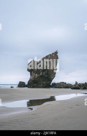 beach playa de aguilar and pena el caballar on the north coast of spain, asturias Stock Photo