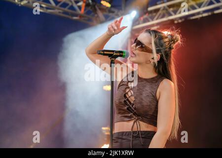 Lulworth, UK. 29th July, 2022. British singer songwriter Grace Barker known professionally as GRACEY (stylized in all caps), who is known for her collaborations with 220 Kid, Xenomania, and as a songwriter for Olly Murs, Rita Ora, Jonas Blue and Florrie, performing live on stage at Camp Bestival family festival. Credit: SOPA Images Limited/Alamy Live News Stock Photo