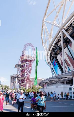 People walk towards the main stage  next to the London stadium, Queen Elizabeth Olympic Park at Stratford for the Great Get TogetherlFestiva Stock Photo