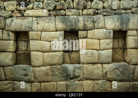 Peru, Machu Picchu, Niches in Inca stone walls showing craftsmanship ...