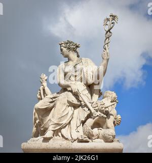 Antique statue in the park of Versailles palace near Paris, France Stock Photo