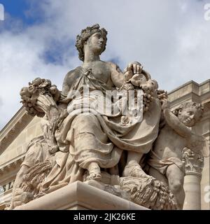 Antique statue in the park of Versailles palace near Paris, France Stock Photo