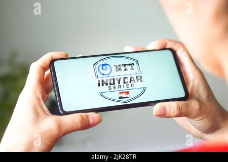 In this photo illustration, the NTT IndyCar Series logo is displayed on a smartphone screen. Stock Photo