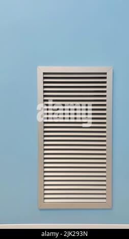 square metal ventilation grate in a blue wall, close view, delivers fresh air and cools Stock Photo