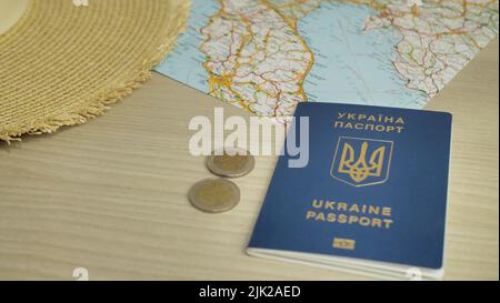 Ukrainian biometric passport id to travel the Europe without visas on the table. Inscription in Ukrainian Ukraine Passpor Stock Photo