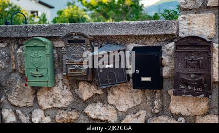 many mailboxes on the wall. Stock Photo
