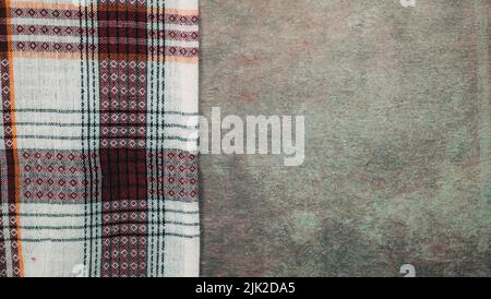 Kitchen towel or napkin over the rustic concrete table. View from above with copy space Stock Photo