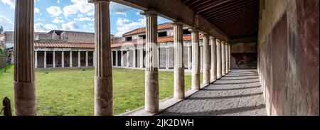 OPLONTIS, ITALY - MAY 03, 2022 - Garden and colonnade of the ancient Roman Villa Oplontis near Pompeii, Southern Italy Stock Photo