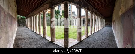 OPLONTIS, ITALY - MAY 03, 2022 - Garden and colonnade of the ancient Roman Villa Oplontis near Pompeii, Southern Italy Stock Photo