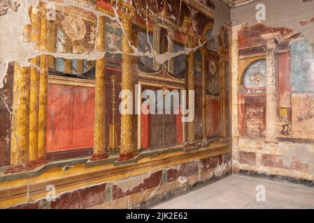 OPLONTIS, ITALY - MAY 03, 2022 - Scenic frescos on the wall of famous Villa Oplontis, ancient Roman villa and world heritage sight, Southern Italy Stock Photo