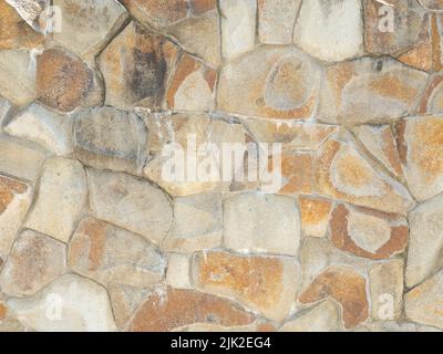 Wall cladding with coarse decorative stone. Not a seamless texture. Stock Photo