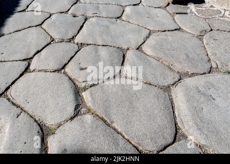 A beautiful typical cobbled street in the ancient city of Pompeii, Southern Italy Stock Photo