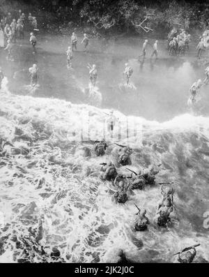 US Marines going ashore in heavy seas as during the Cape Gloucester landings, New Britain, during the Second World War. Stock Photo