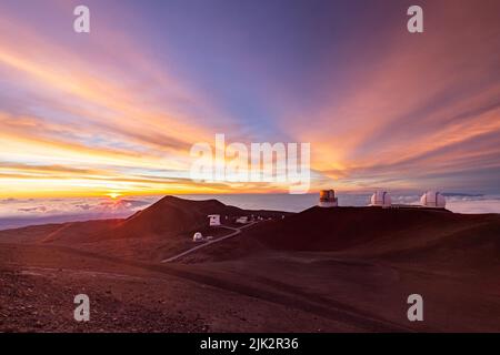 Beautiful sunset of Mauna Kea and Observatory in Big Island, Hawaii Stock Photo