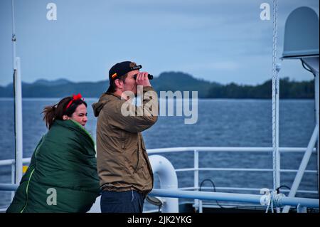 Mature couple standing on the deck of the ferry Stock Photo