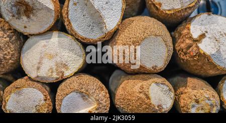 Pile of Yam Tubers ready for cooking Stock Photo