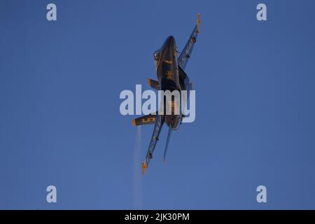 United States Navy Blue Angel No. 5,  F/A-18 Super Hornet steaks through the sky during winter training at NAF El Centro. Stock Photo