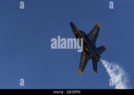 United States Navy Blue Angel F/A-18 Super Hornet steaks through the sky during winter training at NAF El Centro. Stock Photo