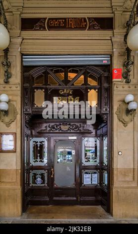 Pamplona, Spain - June 21, 2021: Ornate facade of historic coffee shop Iruna, frequented by Ernest Hemingway on Plaza del Castillo square in Old Town Stock Photo