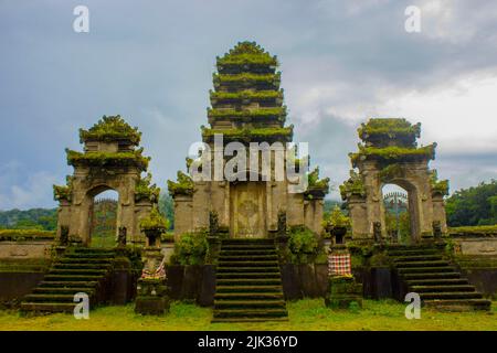 hindu temple ruins of Pura Hulun Danu at the Tamblingan lake, Bali, Indonesia Stock Photo