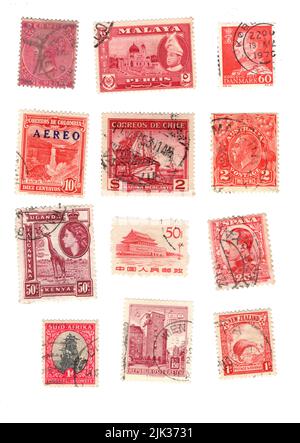 A selection of old postage stamps from around the world. Stock Photo