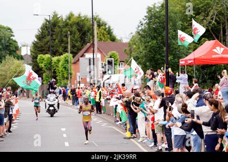 Uganda’s Victor Kiplangat leads from Tanzania's Alphonce Felix Simbu during the Men's Marathon on day two of the 2022 Commonwealth Games in Birmingham. Picture date: Saturday July 30, 2022. Stock Photo