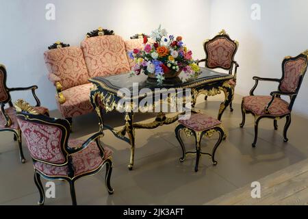 Black and Golden Salon Furniture (Baroque and Rococo, mid 18th-late 19th century). From the Murska Sobota castle-Slovenia. Stock Photo