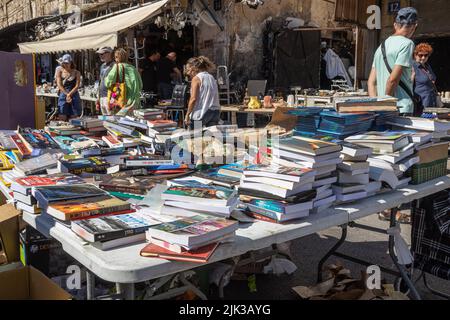 Haifa, Israel - 20 July 2022, Scene of the flea market, with sellers and shoppers, in downtown Haifa, Israel Stock Photo