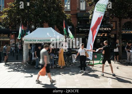 Toulouse, France. 30th July, 2022. At the call of the Collectif Palestine Vaincra, rehabilitated by the Council of State a few weeks ago, several activists organized an information stand for the boycott of the Champions Trophy (Trophée des Champions), and more broadly of Israeli products. The Champions Trophy is a football match between PSG (champion of Ligue 1) and FC Nantes (winner of the Coupe de France) on July 31, 2022 in Tel Aviv (Israel). For the Collective, this trophy is a commercial operation organized by the Professional Football League, around promoters of 'sports diplomacy'. They  Stock Photo