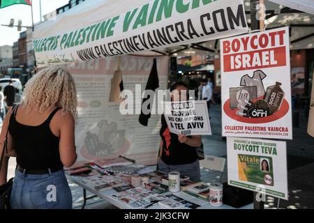 Toulouse, France. 30th July, 2022. At the call of the Collectif Palestine Vaincra, rehabilitated by the Council of State a few weeks ago, several activists organized an information stand for the boycott of the Champions Trophy (Trophée des Champions), and more broadly of Israeli products. The Champions Trophy is a football match between PSG (champion of Ligue 1) and FC Nantes (winner of the Coupe de France) on July 31, 2022 in Tel Aviv (Israel). For the Collective, this trophy is a commercial operation organized by the Professional Football League, around promoters of 'sports diplomacy'. They  Stock Photo