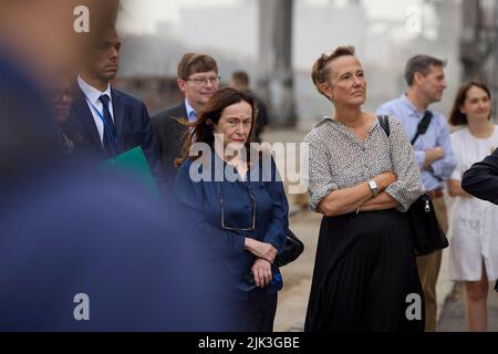 Chornomorsk, Ukraine. 29th July, 2022. UK Amb. Melinda Simmons, left, joins German Amb. Anka Feldhusen, right, view grain loaded during a visit to the Chornomorsk Sea Trade Port, July 29, 2022 in Chornomorsk, Odessa Oblast, Ukraine. The Turkish flagged cargo vessel Polarnet, is the first ship is loaded at the port since the beginning of the war. Credit: Ukrainian Presidential Press Office/Ukraine Presidency/Alamy Live News Stock Photo