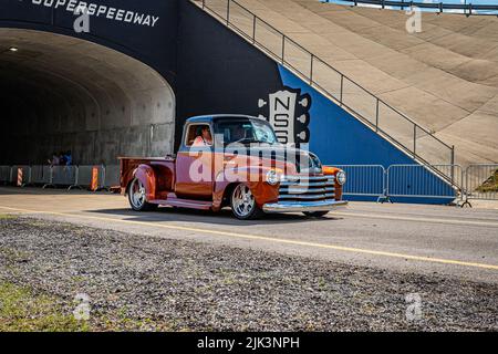 Lebanon, TN - May 14, 2022: Wide angle front corner view of a custom 1950 Chevrolet 3100 Pickup Truck leaving a local car show. Stock Photo