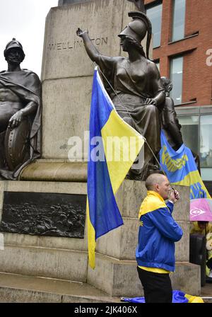 Manchester, UK, 30th July, 2022. “Stand with Ukraine” anti-war rally, a protest about the Russian invasion of Ukraine in Piccadilly Gardens, central Manchester, England, United Kingdom, British Isles. The protests are organised by the Ukrainian Cultural Centre, Manchester. Credit: Terry Waller/Alamy Live News Stock Photo