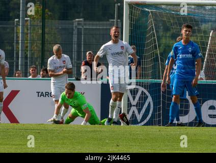 Illertissen, Germany. 30th July, 2022. Soccer: DFB Cup, FV Illertissen - 1. FC Heidenheim, 1st round, Vöhlin Stadium. Heidenheim's Adrian Beck celebrates after the 0:2. Credit: Stefan Puchner/dpa - IMPORTANT NOTE: In accordance with the requirements of the DFL Deutsche Fußball Liga and the DFB Deutscher Fußball-Bund, it is prohibited to use or have used photographs taken in the stadium and/or of the match in the form of sequence pictures and/or video-like photo series./dpa/Alamy Live News Stock Photo