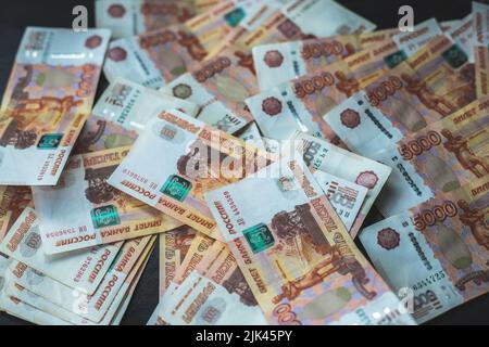 Heap of Russian money banknotes of five thousand rubles Stock Photo