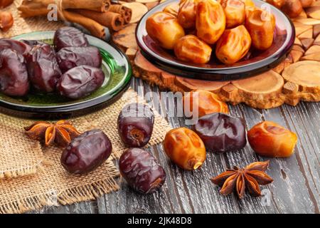 dates group on wood background Stock Photo