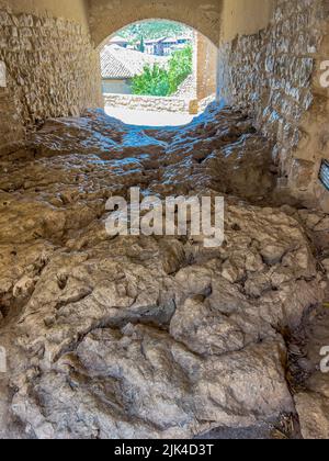 a medieval stone passageway in Alquezar Spain Stock Photo