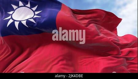 Close-up view of Taiwan flag waving in the wind. Taiwan, officially the Republic of China, is a country in East Asia Stock Photo