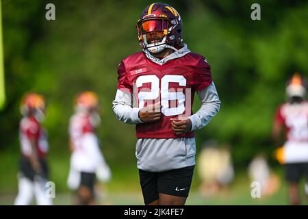 Ashburn, VA, USA. 30th July, 2022. Washington Commanders cornerback Corn Elder (26) runs a drill during the Washington Commanders Training Camp practice at the INOVA Sports Performance Center in Ashburn, Va. Reggie Hildred/CSM/Alamy Live News Stock Photo